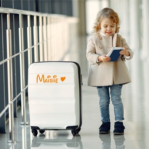 Custom suitcase sticker name. Orange sticker with heart. Custom-made in three different sizes.