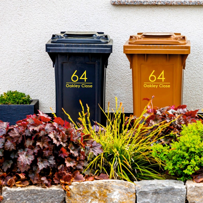 Custom, yellow adhesive bin stickers with your personalised house number and address. Our wheelie bin stickers are handmade using waterproof vinyl. Sold in a variety of sizes in sets of 2, 3 or 4.