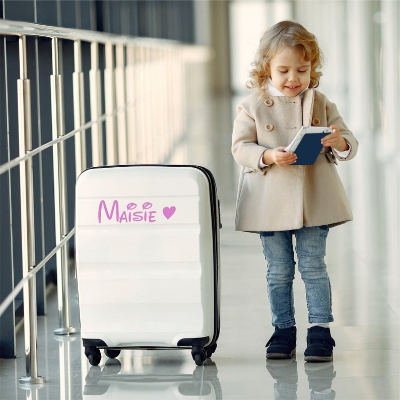 Custom suitcase sticker name. Pink sticker with heart. Custom-made in three different sizes.