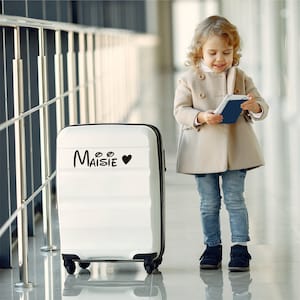 Custom suitcase sticker name. Black sticker with heart. Custom-made in three different sizes.