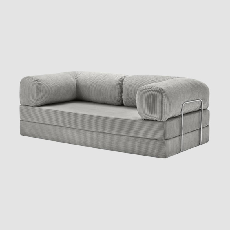 May include: A set of three ceramic mugs with a speckled, matte finish. The mugs are in shades of cream, light gray, and dark gray. Each mug has a simple, minimalist design, perfect for coffee or tea.