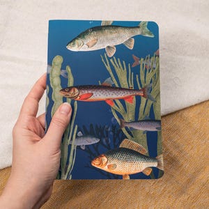 A5 Handmade Notebook with Vintage Fish Design - held in hand