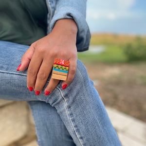 Hand painted ring on wood with Sicilian cart style decoration