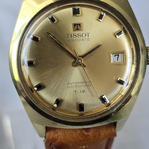 【稼働】ティソ シースター 1990年代 ゴールドウォッチ ヴィンテージ 腕時計 Tissot seastar t12 - Etsy 日本