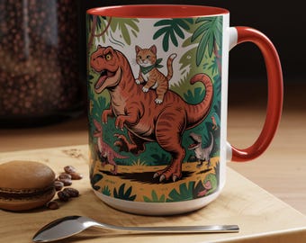 Taza de gato naranja montando un T-rex Taza divertida para amantes de los gatos Taza de Cat Raptors the Jungle Regalo para amantes de los dinosaurios felinos Regalo para dama gata Mamá gata Navidad