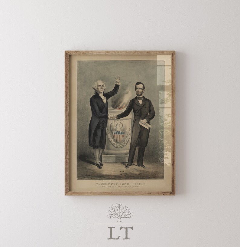 May include: A framed vintage print of George Washington and Abraham Lincoln standing together. The print is in a wooden frame and has a faded, antique look. The text below the image reads "Washington and Lincoln, The Fathers of the Republic, and the Saviors of our Country."