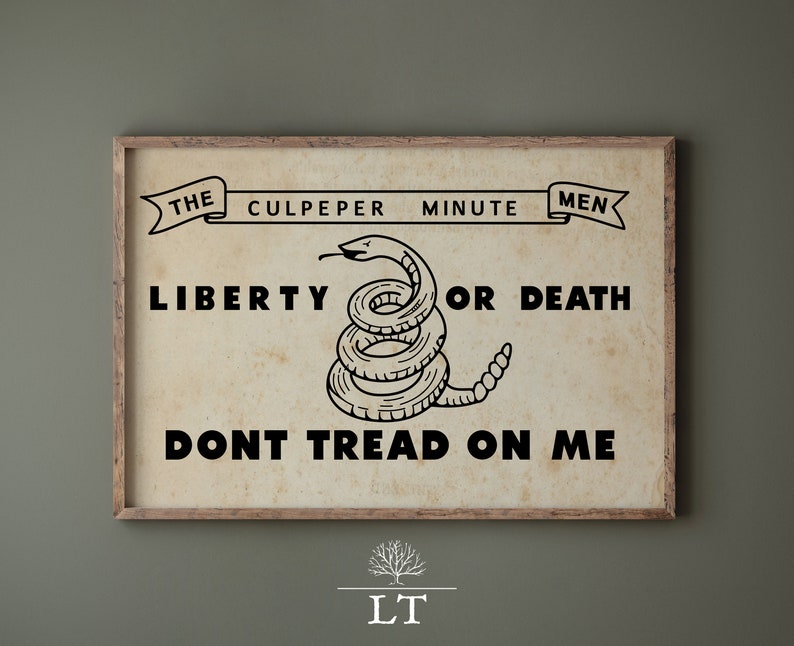 May include: A vintage-style print featuring a coiled rattlesnake with the text "The Culpeper Minute Men Liberty or Death Don't Tread On Me".
