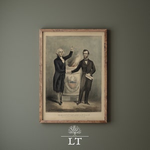 May include: A framed print of a historical painting depicting George Washington and Abraham Lincoln standing together. The painting is in a brown wooden frame and has a white background. The text "WASHINGTON AND LINCOLN" is printed at the bottom of the image.