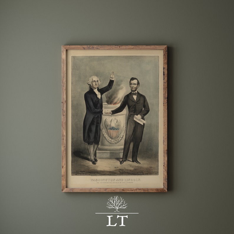 May include: A framed print of a historical painting depicting George Washington and Abraham Lincoln standing together. The painting is in a brown wooden frame and has a white background. The text "WASHINGTON AND LINCOLN" is printed at the bottom of the image.
