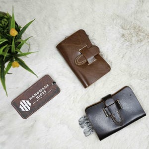 Set di 2 portafogli portachiavi in pelle – Nero e marrone / 6 ganci per chiavi / Organizer compatto per chiavi con tasca / Custodia per chiavi adatta ai viaggi