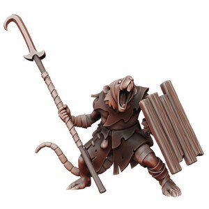 May include: A brown painted miniature figurine of a rat-like creature holding a spear and a shield. The creature has a fierce expression and is wearing tattered clothing.