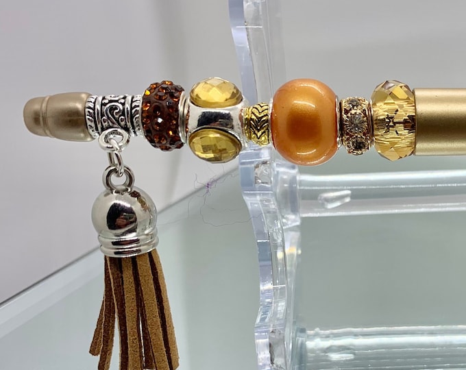 Bejeweled gold & orange writing pen w/ leather tassel