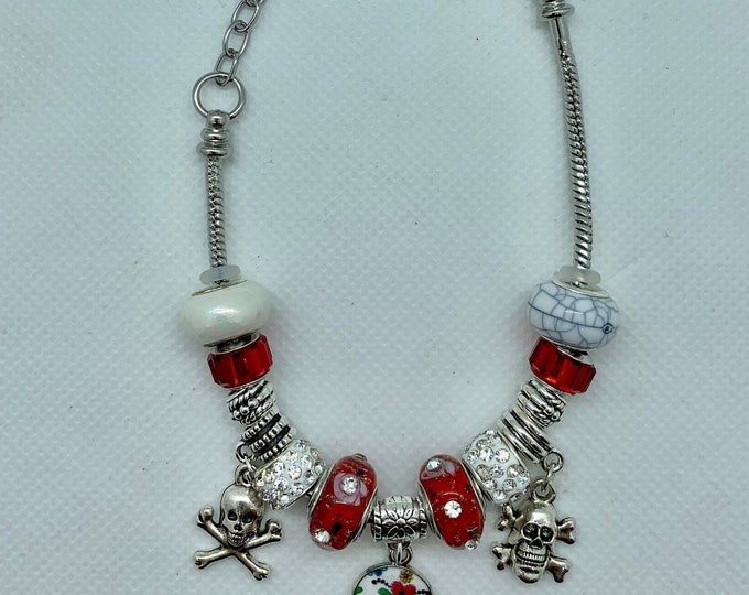 Bejeweled, red and silver Sugar Skull charm bracelet with skull & crossbones