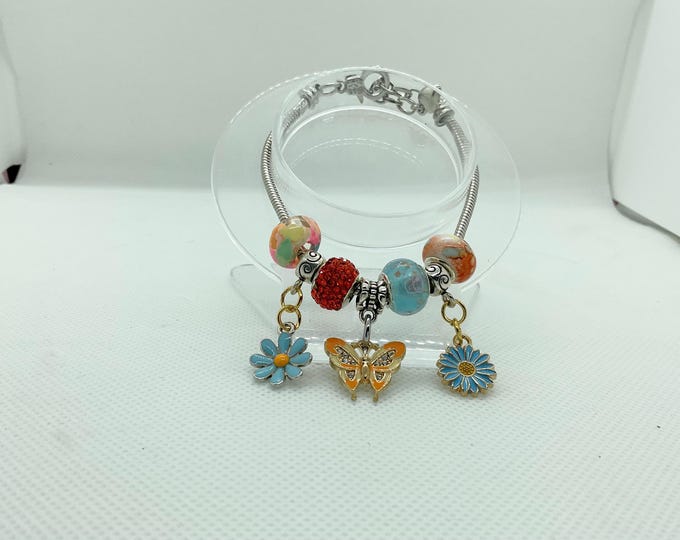 Butterfly & Blue Daisy Bracelet – Orange and Turquoise Boho Beaded Jewelry, Handmade Gift for Her, Colorful Nature-Inspired Charm Bracelet