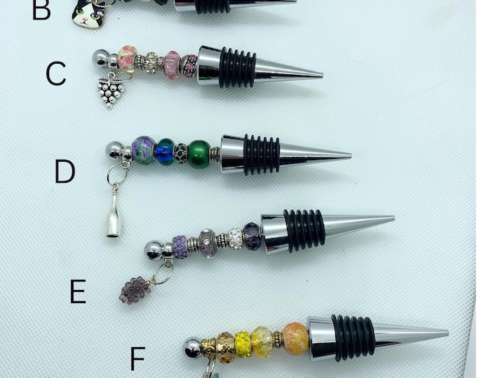 Luxury beaded wine stopper 12.00 each with crystals and charm of your choice. Pick yours or keep ours!
