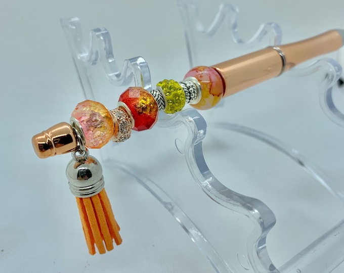 Bejeweled tangerine writing pen w/ leather tassle