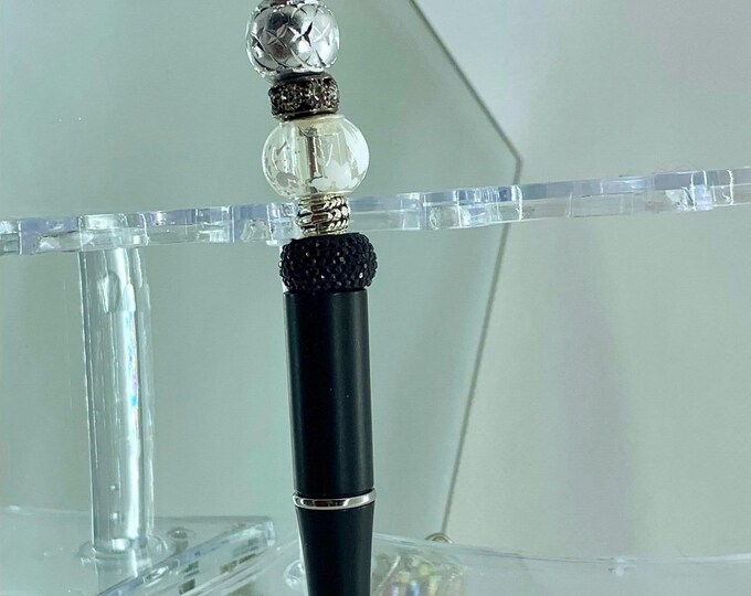 Bejeweled Black Crystal Writing Pen includes  1 charm