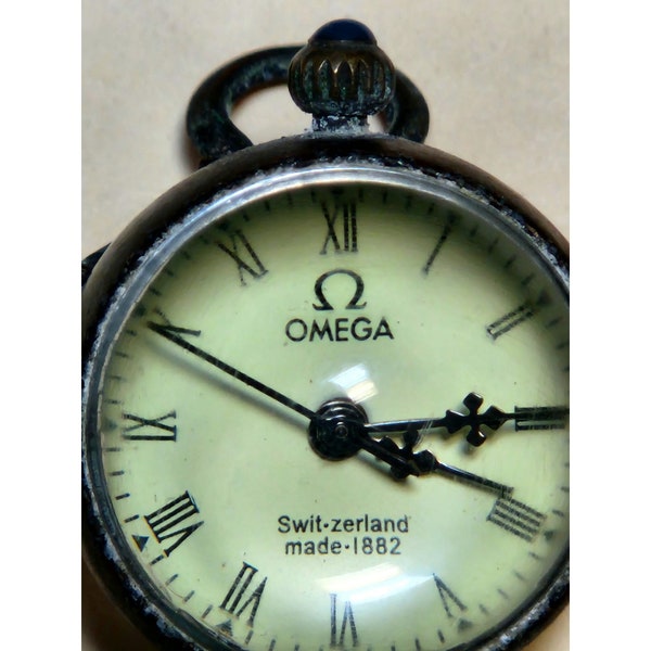 Omega Switzerland made 1882 Pocket Watch w/ Globular Brass Body and Magnified Blass Covers
