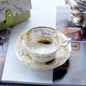 Staffordshire Porcelain Cup and Saucer, c.1810, with Hand Painted Colorful Birds & Landscapes, Pattern no 139