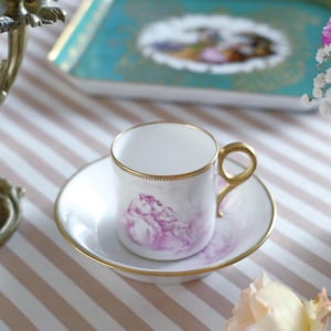 Antique Hand Painted Coffee Can and Saucer, with the scene of courting couple in pink palette.