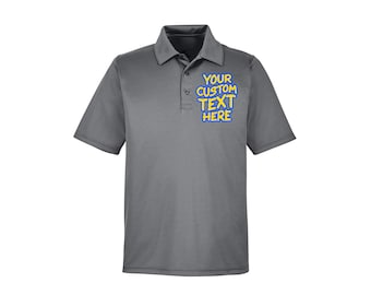 May include: Gray polo shirt with short sleeves and a collared neckline. The shirt features the text "YOUR CUSTOM TEXT HERE" in blue and yellow on the left chest. The shirt is made of a smooth, likely synthetic material.