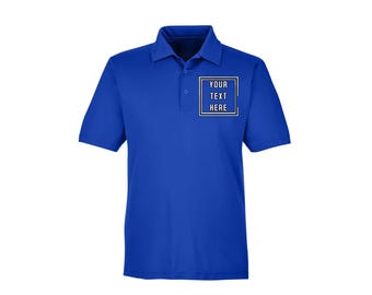 May include: A royal blue polo shirt with short sleeves. The shirt has a collar and a three-button placket. A white square with the text "YOUR TEXT HERE" is on the left chest.