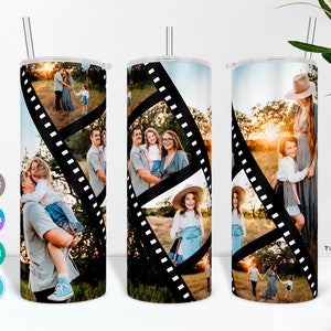 May include: A white tumbler with a black and white film strip design. The tumbler features photos of a family, including a couple, children, and a baby. The photos are arranged in a collage style.