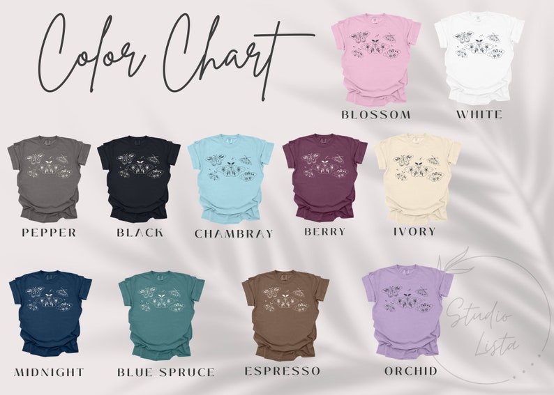 May include: Color chart showing 10 different t-shirt colors with a floral design. The colors are: Pepper, Black, Chambray, Berry, Ivory, Midnight, Blue Spruce, Espresso, Orchid, Blossom, and White.
