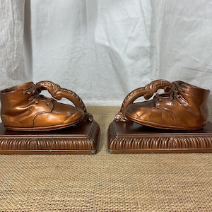 Vintage Pair Of Bronzed Baby Shoe Book Ends.