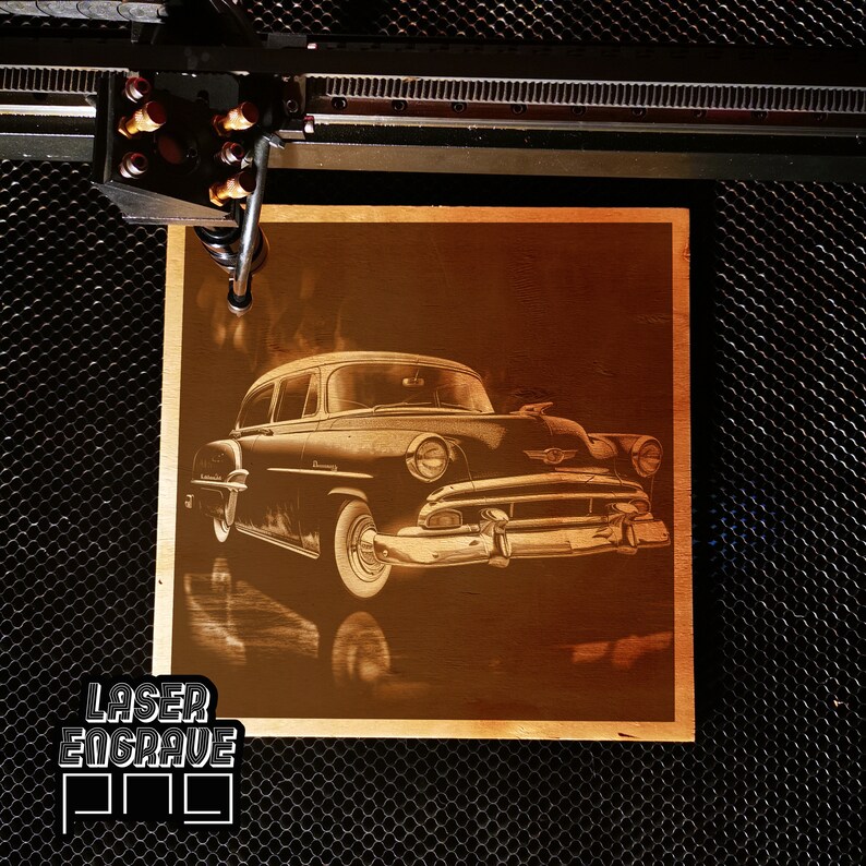 May include: A laser engraved wooden plaque featuring a vintage car in black and white. The car is a 1950s Chevrolet Bel Air. The plaque has a brown background and the car is in the center of the plaque.