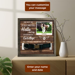 May include: A wooden memorial plaque with a photo of a dog, a collar holder, and the text "You were my FAVORITE Hello and my HARDEST Goodbye IN LOVING MEMORY OF SION". The plaque has a brown wood grain finish and a gray frame. The text "Enter your name and date" is below the plaque.