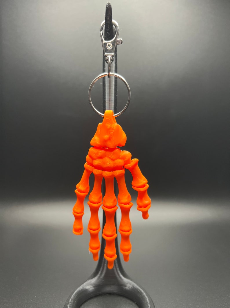 Skeleton Hand Key Chain Flexi Factory Skeleton Hand Keychain! Now Available in Glow Green and ...