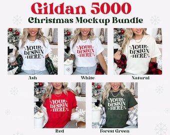 May include: A mockup bundle of five Gildan 5000 t-shirts in different colors, including ash, white, natural, red, and forest green. Each shirt features the text "YOUR DESIGN HERE" in red and white.