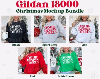May include: Mockup bundle of five Gildan 18000 sweatshirts in different colours: black, sport grey, ash, red, and Irish green. Each sweatshirt features the text "YOUR DESIGN HERE" in white.