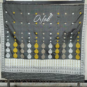 Beautiful Tassar silk and Black Mulberry with Dyed Yellow Eri silk, White Eri silk and Tassar Ghicha on the motifs, from Assam, India