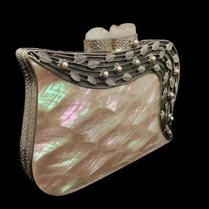Pearl embellished evening purse with designer metal frame
