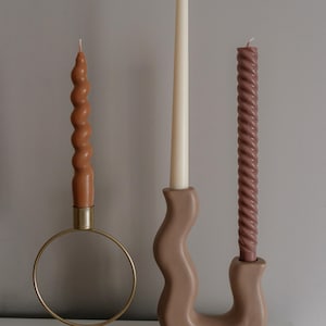 Velas altas y cónicas tipo pilar