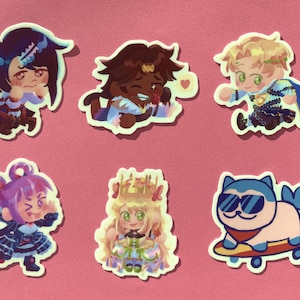 May include: Six colorful cartoon character stickers with a white border. The stickers feature a girl with purple hair, a girl with blonde hair, a girl with brown hair, a boy with blonde hair, a boy with blue hair, and a blue cat wearing sunglasses.