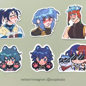 May include: A set of six anime-style stickers depicting characters with emotive expressions. The stickers feature characters with blue, red, and black hair, some with animalistic traits. The stickers are set against a pale green backdrop.