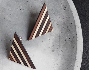 Elegant handmade triangle shape earrings with stripes, made from recycled wood and with silver hardware
