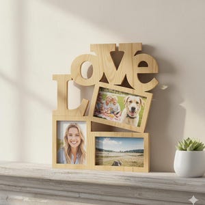 May include: Wooden photo frame in the shape of the word "LOVE". The frame holds three photos, with the word "LOVE" cut out of the wood. The photos show a family, a woman, and a landscape. A small potted plant sits nearby.