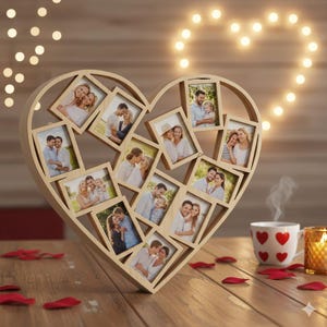 May include: A wooden heart-shaped photo frame with multiple picture slots, filled with various family photos. The frame sits on a wooden surface, with a cup of coffee and a candle nearby. Red rose petals are scattered around the frame.