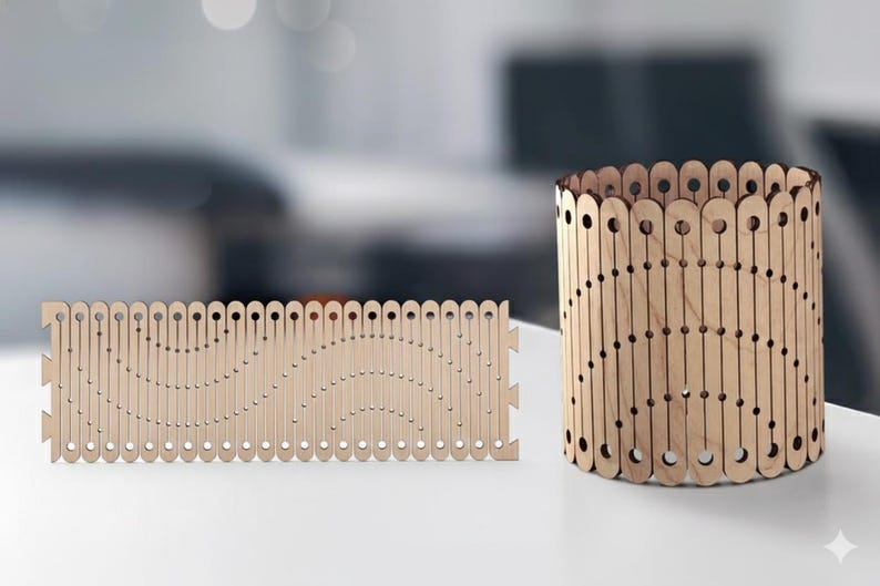 May include: Two wooden decorative items. One is a rectangular panel with a wavy design, and the other is a cylindrical container. Both are made of light-colored wood with a series of cut-out shapes.