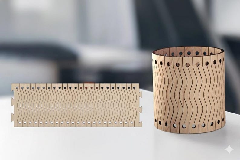 May include: A wooden cylindrical container and a flat wooden panel. Both pieces are made of light-colored wood and feature a wavy, slotted design. The container has a series of evenly spaced holes near the top and bottom edges.