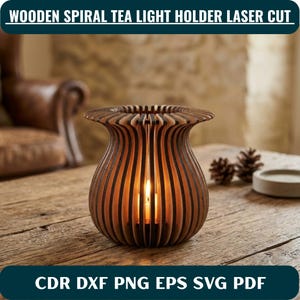 May include: A laser-cut wooden tea light holder with a curved, spiral-slatted design. The structure features dark, charred edges from the cutting process and contains a lit candle inside. The text WOODEN SPIRAL TEA LIGHT HOLDER LASER CUT CDR DXF PNG EPS SVG PDF is visible.