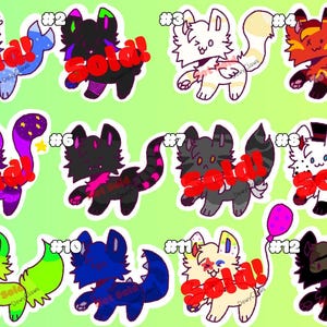 May include: A digital illustration of twelve cartoon cats with different colours and designs. Each cat has a number and the word "Sold!" written on it.