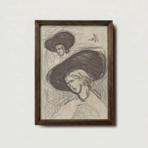 May include: A framed pencil sketch of two figures wearing large hats. The artwork is in shades of gray and black, with visible pencil strokes and shading. The frame is a dark brown color.