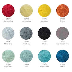 May include: A color chart featuring twelve circular swatches of fuzzy yarn in various shades including Carmen Red, Light Yellow, Sunflower, Orange, Metal Grip, Coal Grey, Black, Red-Black Muline, &Ccedil;ağla Yeşil, Azur, Tropical Sea, and Petrol.