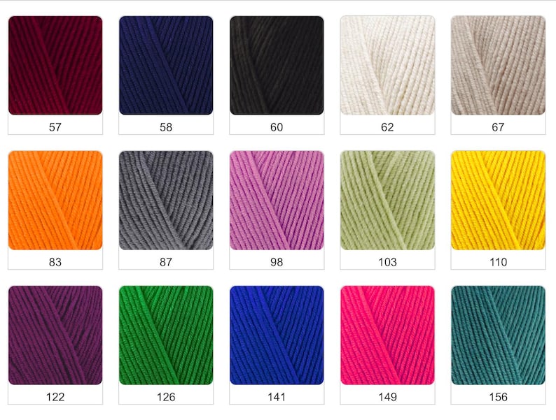 May include: A collection of yarn skeins in various colors, including burgundy, navy blue, black, cream, and tan. Other colors include orange, gray, purple, green, and yellow. Each skein is labeled with a number.