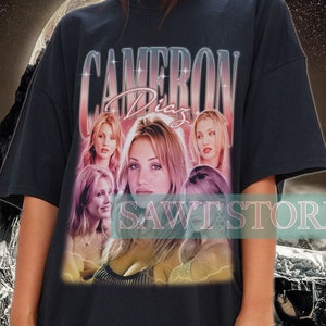 May include: Black oversized t-shirt with a graphic print of a group of women with the text "Cameron Diaz" on the front.